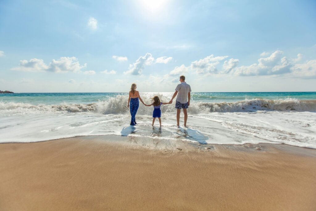 family on the beach chiropractic care independence missouri